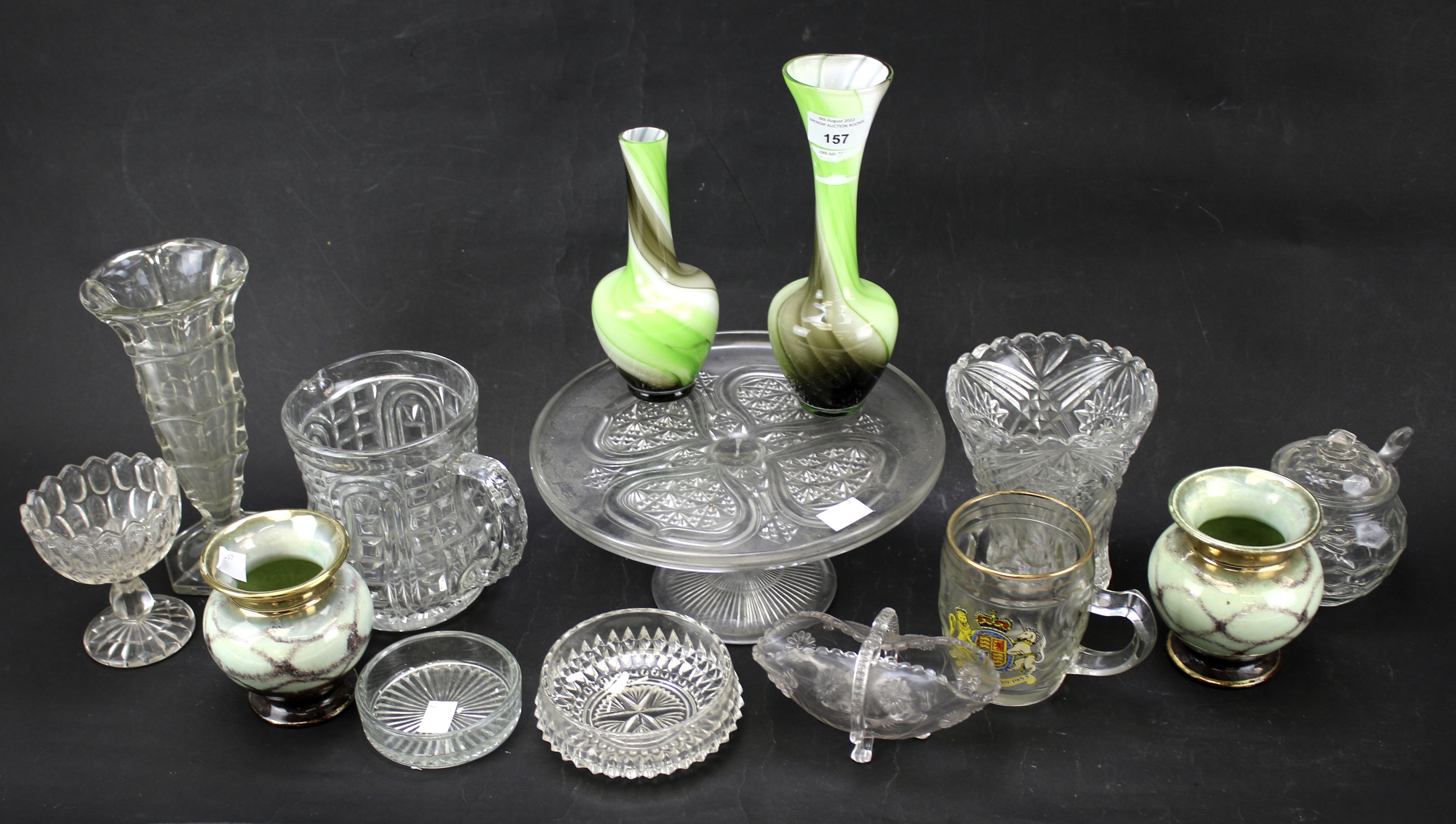 An assortment of glassware and a pair of German vases.