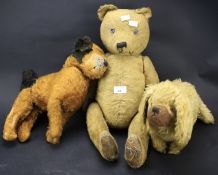 Three antique stuffed toys.