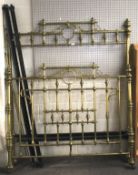 An ornate 4ft 6in double brass bed frame.