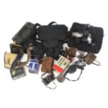 A large collection of cameras and related accessories.