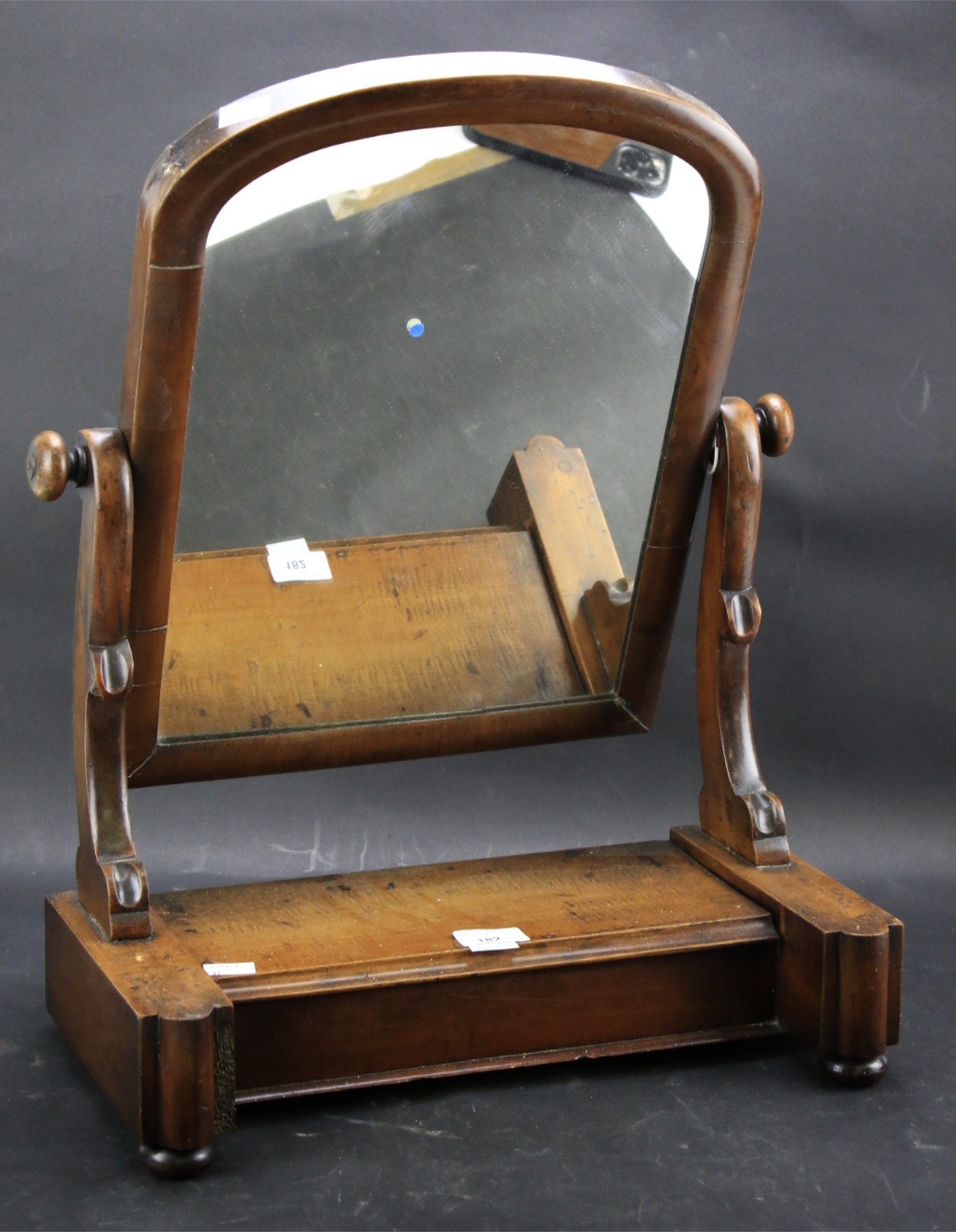 A mahogany dressing table mirror.