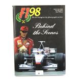 One volume: F198, World Championship photographic review, Behind the scenes, Milan 1998.