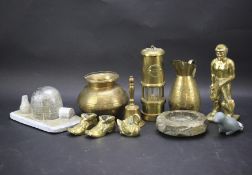 An assortment of brass and collectables.