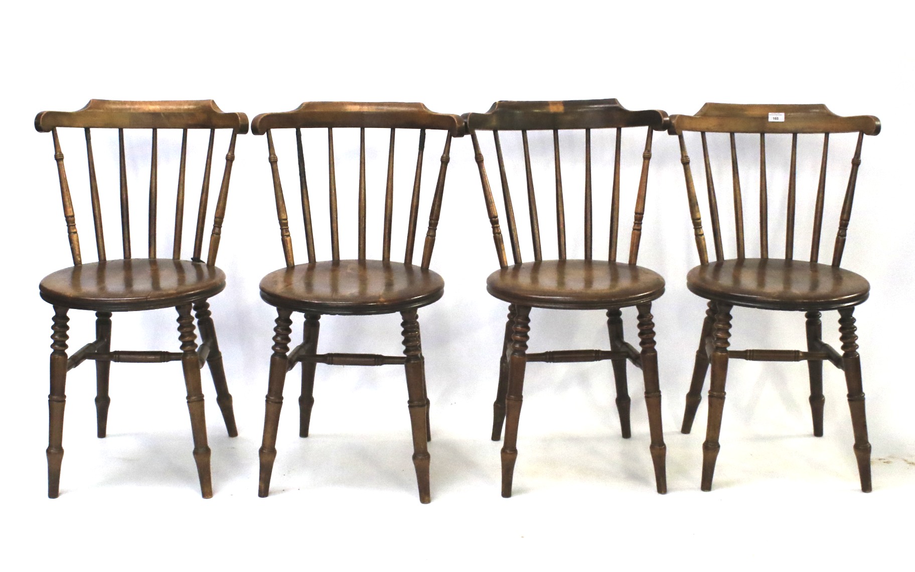 A set of four mahogany chairs and together with a single chair.