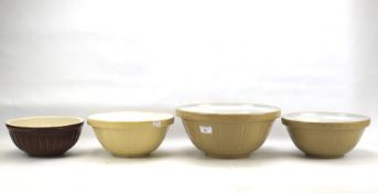 Four contemporary pottery mixing bowls.