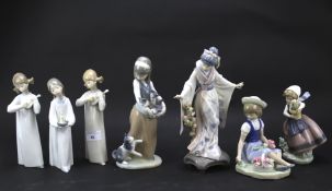 Seven Lladro figures.