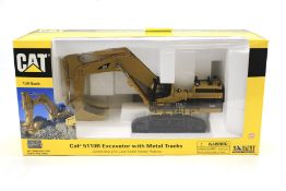 A Cat Excavator with Metal Tracks diecast model. No.