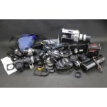 An assortment of cameras and related accessories.