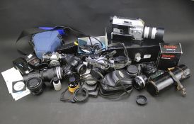 An assortment of cameras and related accessories.