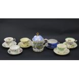 Six teacups and saucers together with a Sadler Staffordshire teapot.