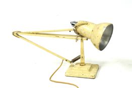 A vintage Herbert cream painted anglepoise lamp.