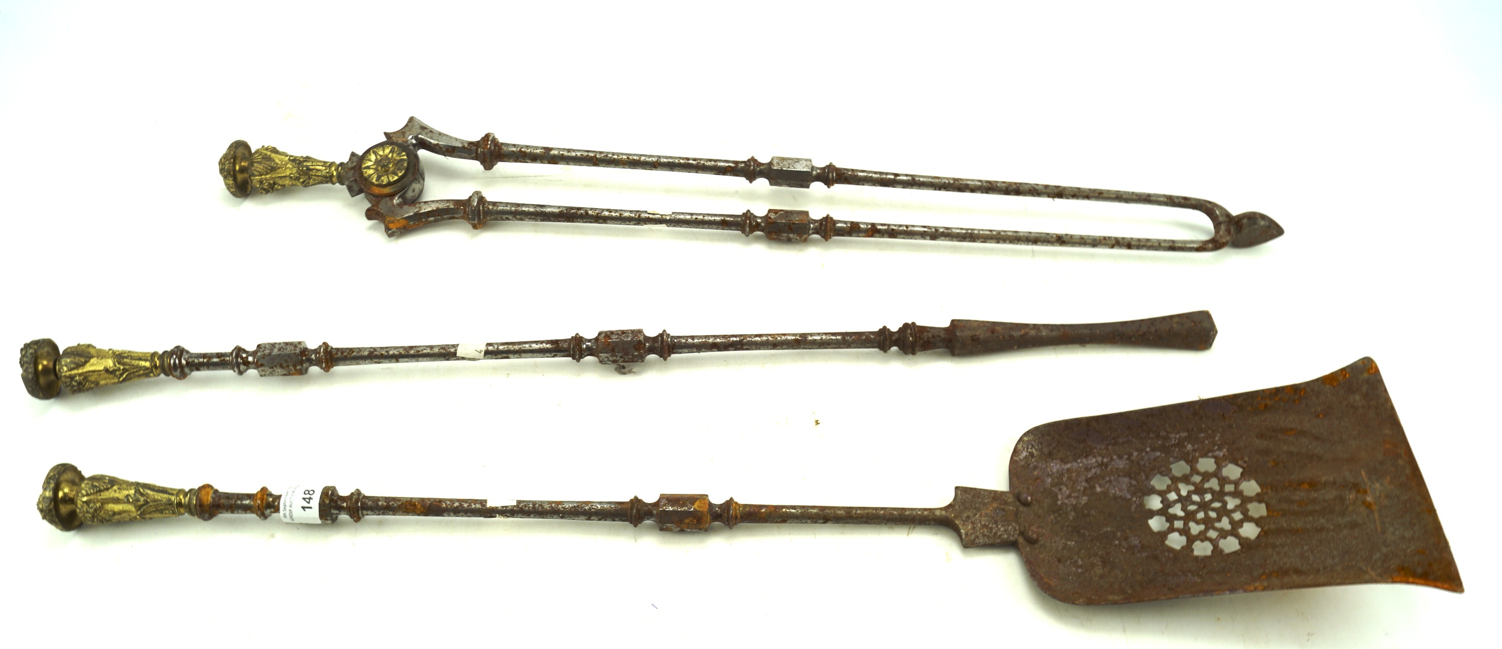 A 19th century fireside irons set.