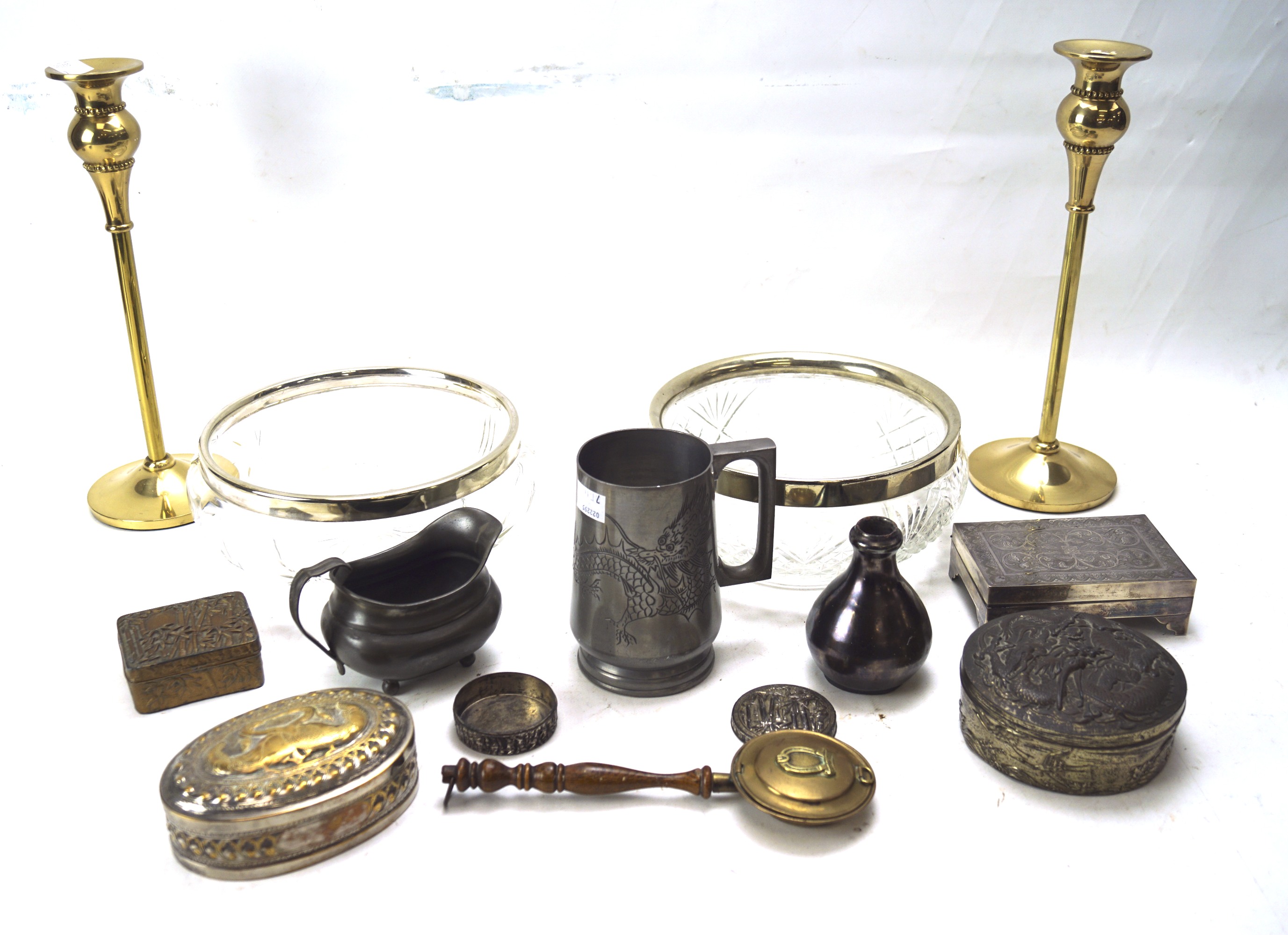 An assortment of metal ware and other items.