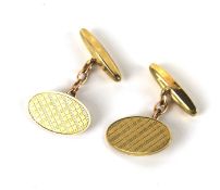 A pair of gents 9ct gold cufflinks.