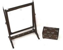 A rosewood tea caddy and a swing mirror. The tea caddy inlaid with mother of pearl,
