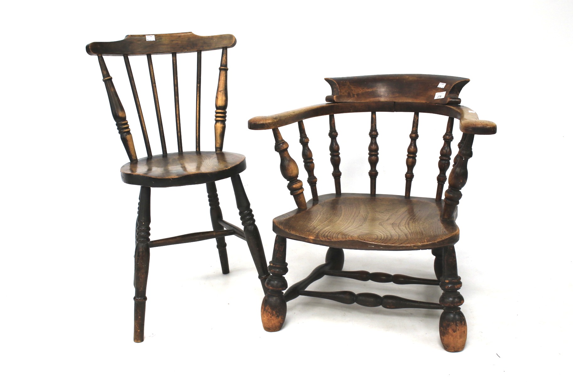 A 19th century shortened arm chair and a similar single chair.