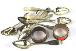 An assortment of 19th and 20th century teaspoons and two napkin rings.