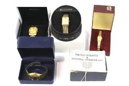 A collection of five boxed wristwatches,
