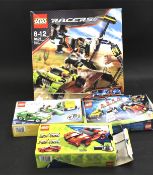 Three boxed Lego Racers and one Lego Creator, numbers 8227, 7967, 6743 and 8496.