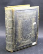 A large Victorian leather bound 'The Holy Bible' by the Revd Matthew Henry.