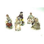 A collection of five continental porcelain figures.