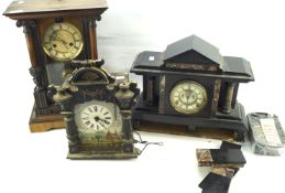 Two wall clocks and slate clock.