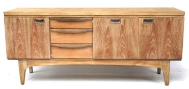 A mid century limed teak sideboard by Greaves & Thomas.