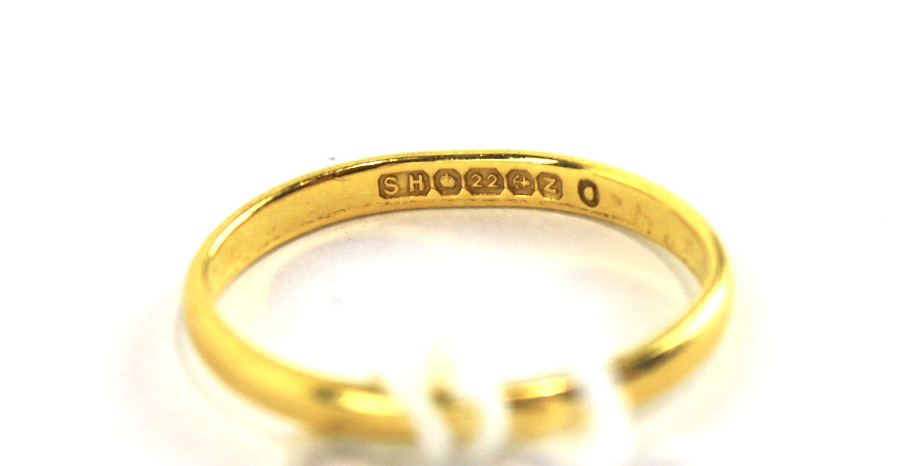 A 22ct gold wedding band. - Image 2 of 2
