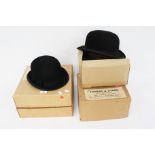 Two black bowler hats. One by G.A.