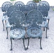 A collection of nine green painted aluminium garden chairs.