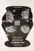 A vintage Biba poster together with a Beatles poster.