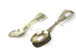 A set of five silver dessert spoons and three silver tablespoons.