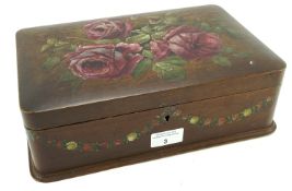 A 20th century wooden work box having painted rose and swag decoration.