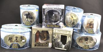 Six boxed 'Lord of the Rings' figures - three soldiers,