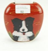 An Anita Harris Staffordshire pottery vase. Decorated with a border collie,