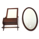 Two bevelled edge wall mirrors.