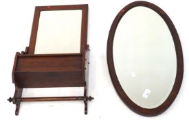 Two bevelled edge wall mirrors.