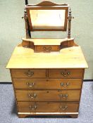 An early 20th century child's dressing table chest.