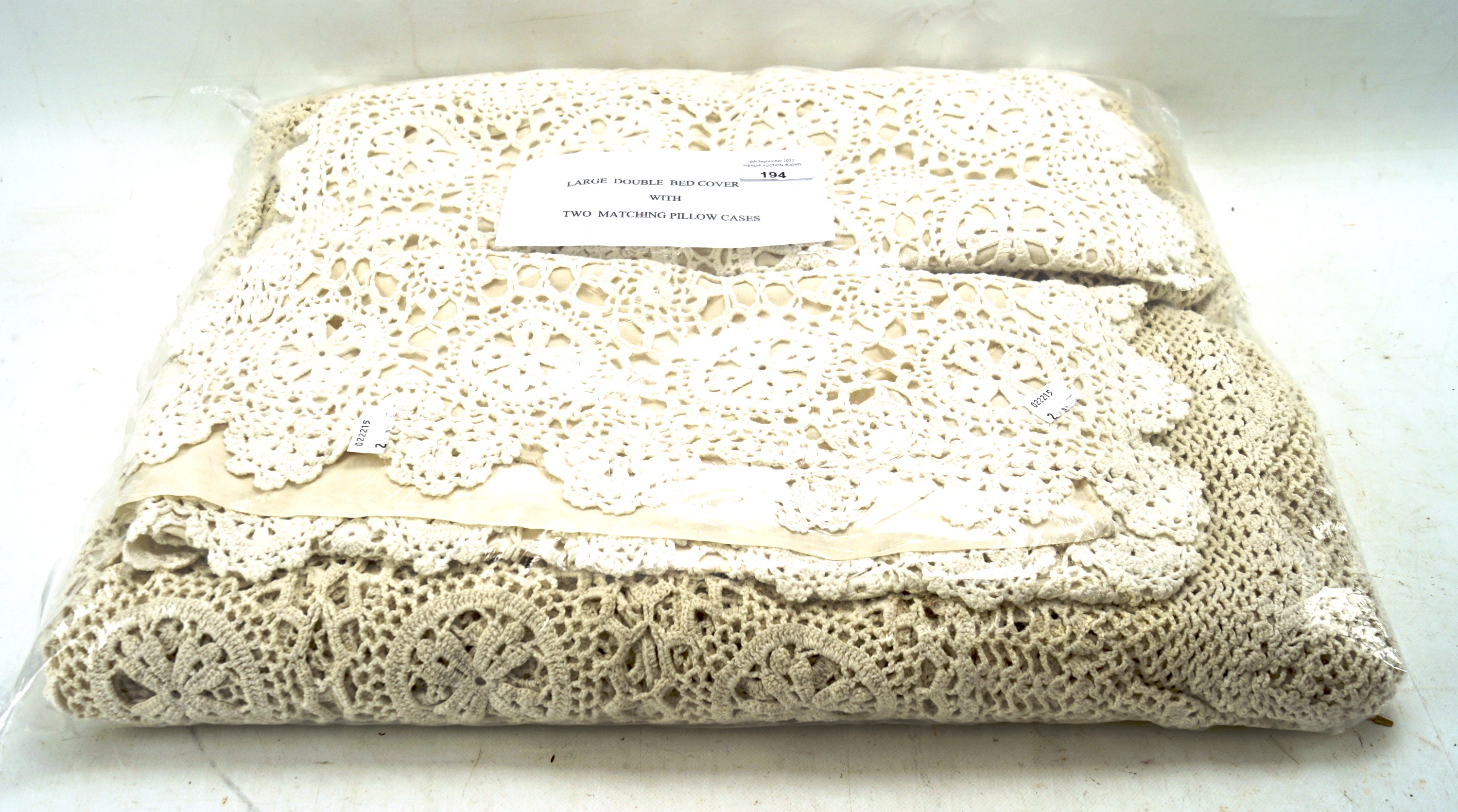A 20th century crochet double bed cover and pillow cases