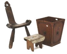 An unusual carved wooden seat, a stool and a wooden basket.