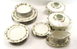 A Royal Doulton 'Vanity Fair' pattern dinner service.