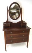 An Edwardian mahogany dressing table with mirror.