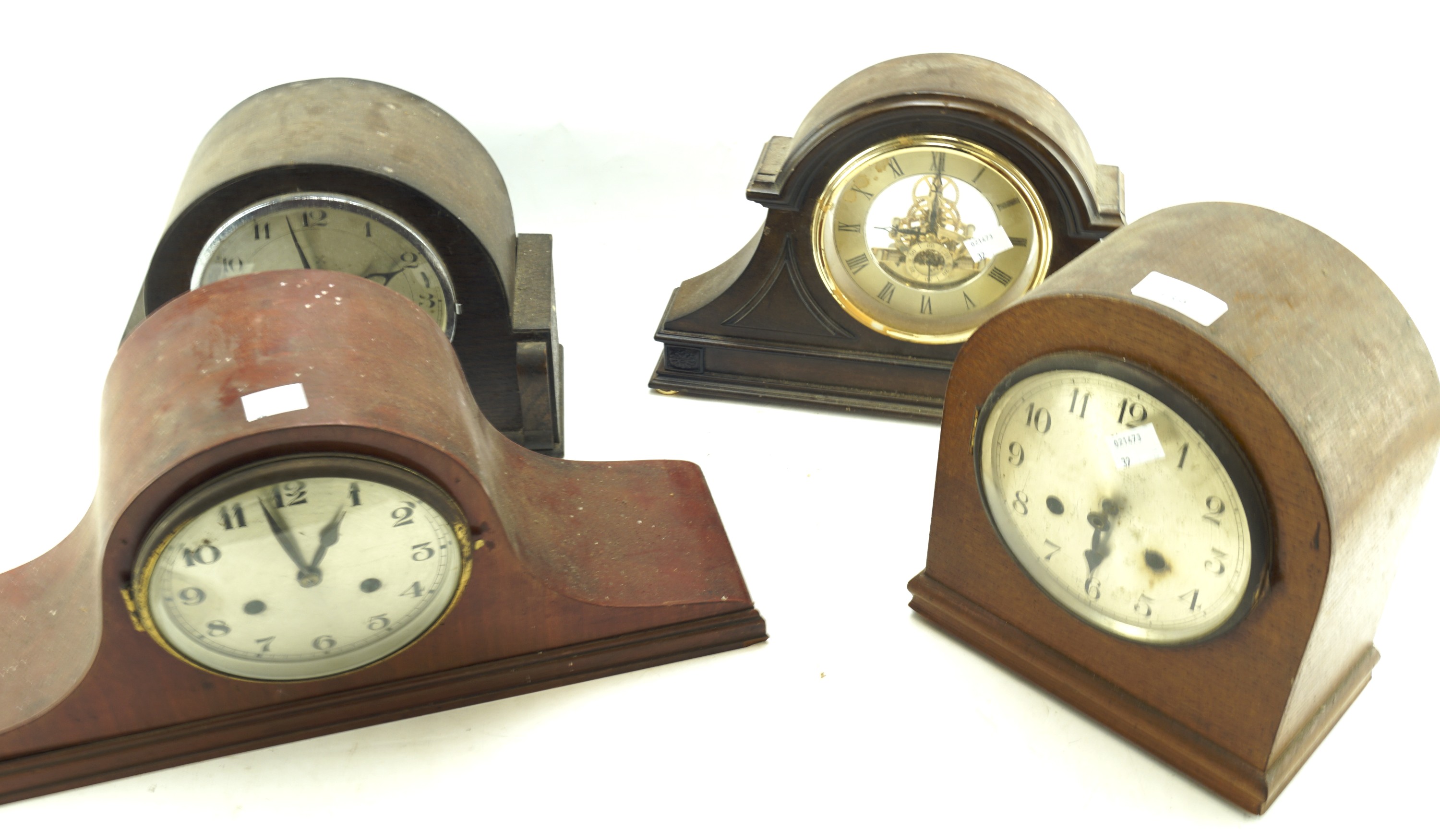 Four 20th century mantle clocks.