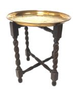 An Eastern brass tray and stand.