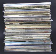 An assortment of vinyl records and albums.
