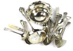 A set of six silver teaspoons and assorted silver plated flatware.