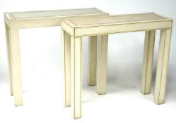 A pair of contemporary painted console tables.