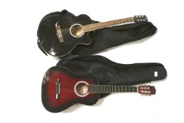 Two acoustic guitars.