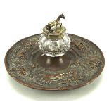A 19th century Sheffield plate circular inkstand having relief decoration of classical figures