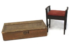 A 1940s wooden underbed storage box and an Edwardian piano stool with rising lid.